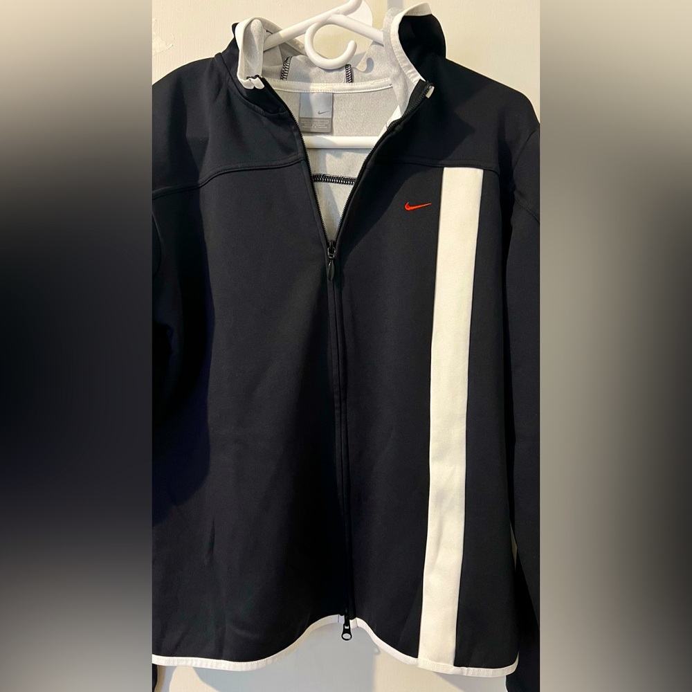 Nike Xl hoodie black white trim is a nylon blend excellent condition
